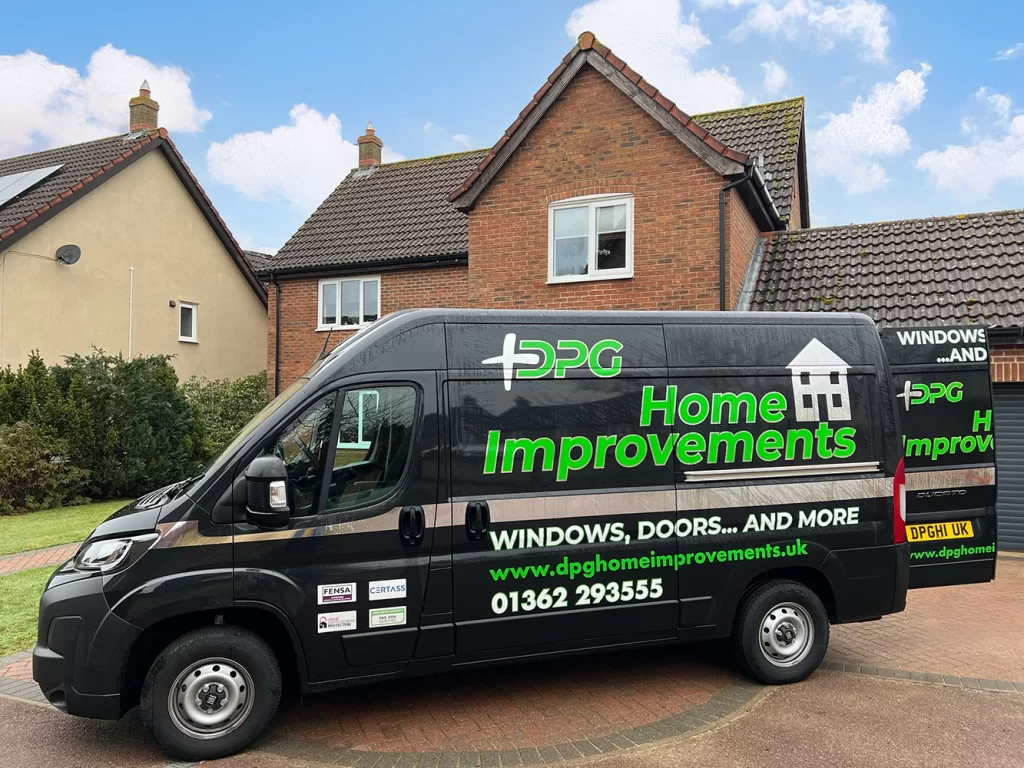 DPG Van parked delivering new doors for installation